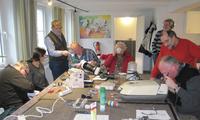 Bild vergr��ern: Reparateure bei der Arbeit - vor der Corona-Pandemie.